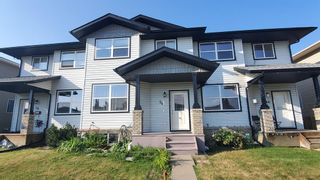 Photo 1: : Lacombe Row/Townhouse for sale : MLS®# A1128923