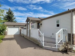 Photo 2: 402 37543 England Way: Rural Red Deer County Mobile for sale : MLS®# A1254874