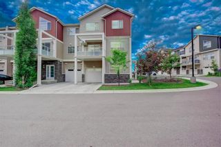 Photo 5: 405 Redstone View NE in Calgary: Redstone Row/Townhouse for sale : MLS®# A1224923
