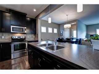Photo 8: 151 COPPERPOND Square SE in Calgary: Copperfield House for sale : MLS®# C4074409
