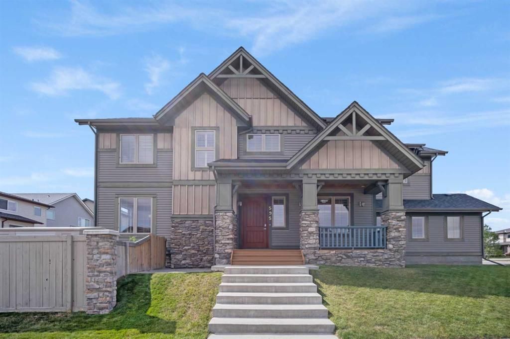 Main Photo: 595 Panamount Boulevard NW in Calgary: Panorama Hills Detached for sale : MLS®# A2074927