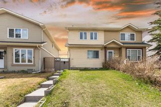 Photo 1: 77 Castlebrook Way NE in Calgary: Castleridge Semi Detached (Half Duplex) for sale : MLS®# A2130628