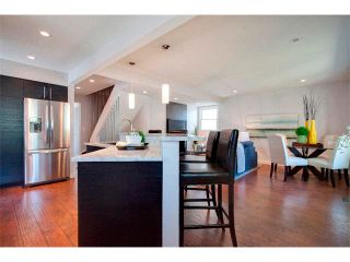 Photo 4: 1049 REGAL Crescent NE in Calgary: Renfrew_Regal Terrace House for sale : MLS®# C4013292