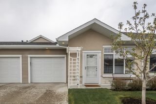 Photo 1: 16 Sunvale Place NE: High River Row/Townhouse for sale : MLS®# A1220351