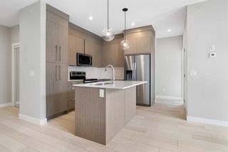 Photo 1: 1406 681 Savanna Boulevard NE in Calgary: Saddle Ridge Apartment for sale : MLS®# A2129782