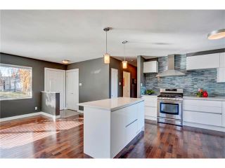 Photo 2: 5612 LADBROOKE Drive SW in Calgary: Lakeview House for sale : MLS®# C4036600