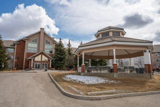 Photo 1: 213 6868 Sierra Morena Boulevard SW in Calgary: Signal Hill Apartment for sale : MLS®# A2040398