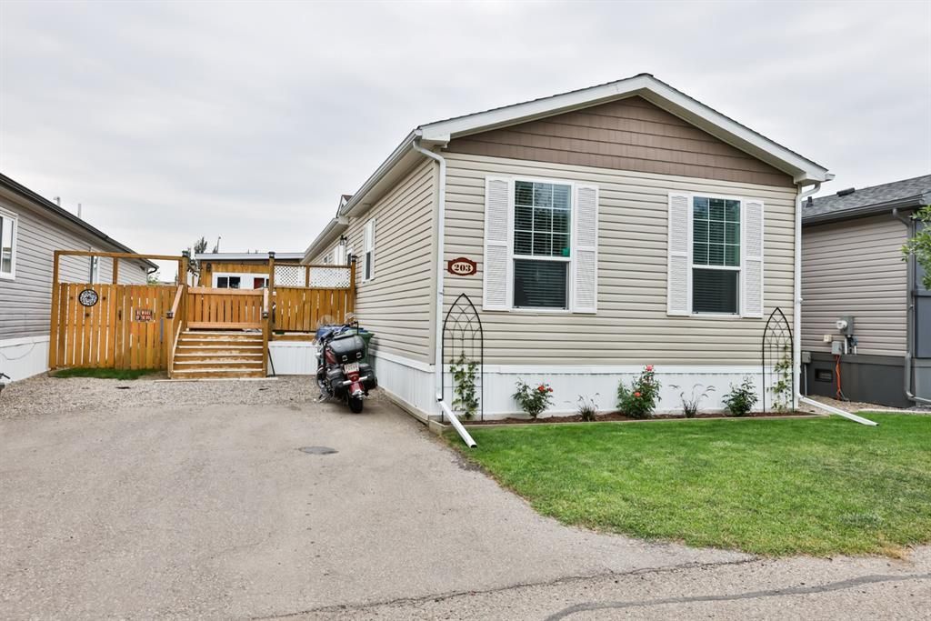 Main Photo: 203 Station Boulevard in Coaldale: House for sale : MLS®# A1246683