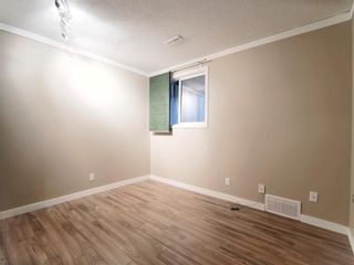 Photo 21: 105 Oaktree Lane SW in Calgary: Oakridge Semi Detached for sale : MLS®# A1164276