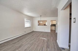 Photo 8: 8631 48 Avenue NW in Calgary: Bowness Detached for sale : MLS®# A2130721