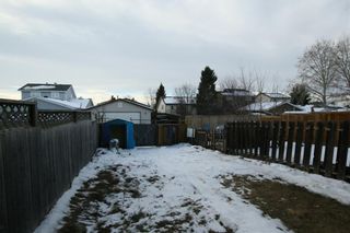 Photo 10: 563 Abinger Road NE in Calgary: Abbeydale Row/Townhouse for sale : MLS®# A1187799