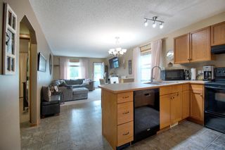 Photo 9: 584 Stonegate Way NW: Airdrie Semi Detached for sale : MLS®# A1245597