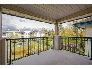 Photo 22: 313 19528 FRASER Highway in Surrey: Cloverdale BC Condo for sale in "The Fairmont" (Cloverdale)  : MLS®# R2684158
