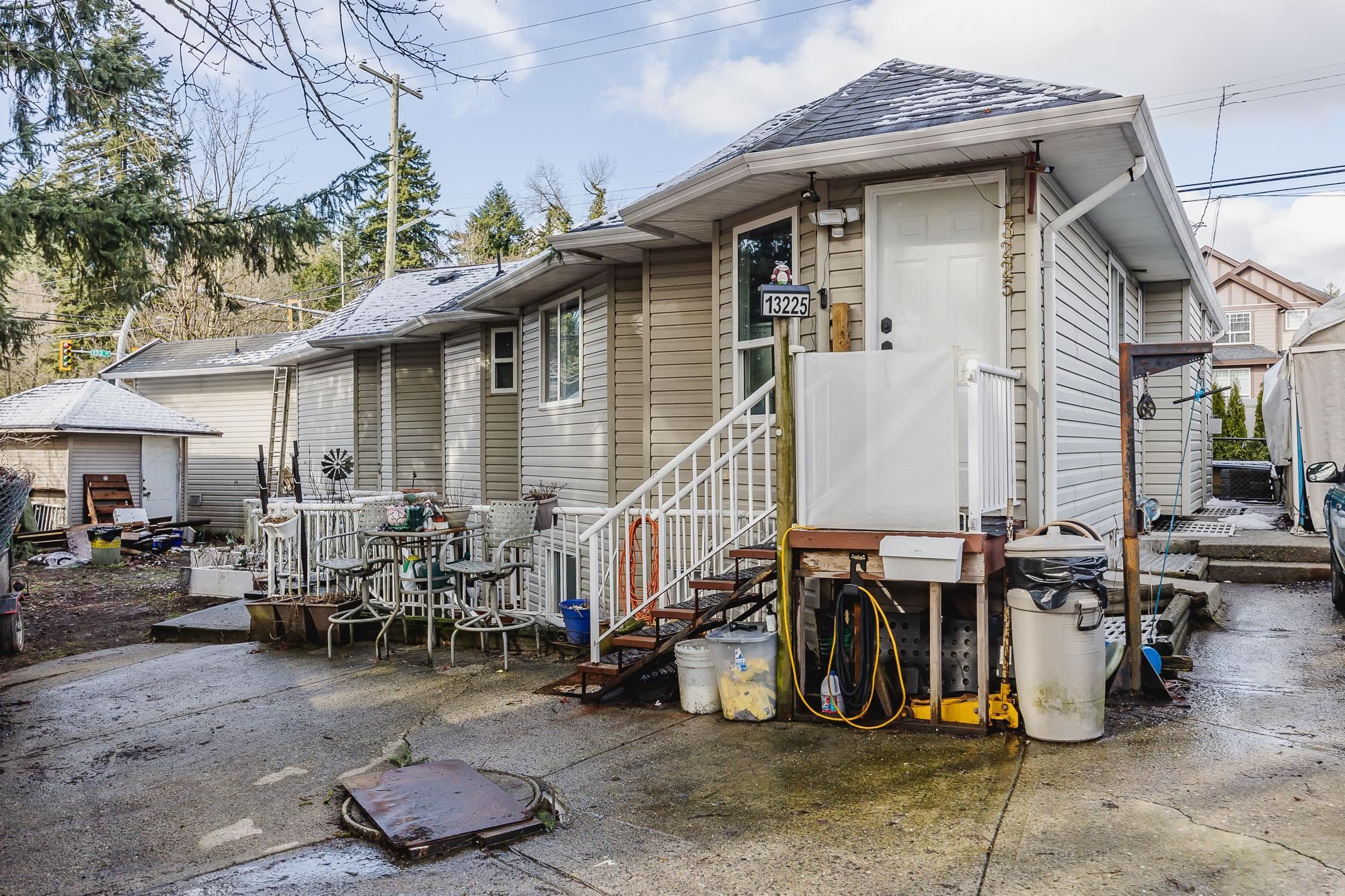 Main Photo: 13225 87B Avenue in Surrey: Queen Mary Park Surrey House for sale : MLS®# R2850343