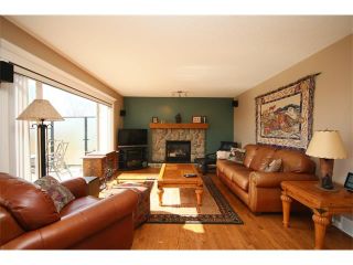 Photo 8: 51 GLENEAGLES View: Cochrane House for sale : MLS®# C4008842