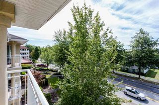 Photo 18: 405 13727 74 Avenue in Surrey: East Newton Condo for sale in "Kings Court" : MLS®# R2201896