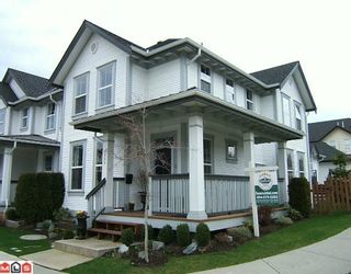 Photo 1: 7006 179A Street in Surrey: Cloverdale BC House for sale in "Provinceton" (Cloverdale)  : MLS®# F1004719