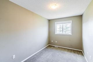 Photo 13: 15 Country Village Villas NE in Calgary: Country Hills Village Row/Townhouse for sale : MLS®# A2140743