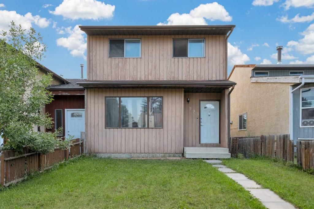 Main Photo: 223 Pinemill Mews NE in Calgary: Pineridge Semi Detached (Half Duplex) for sale : MLS®# A2066427