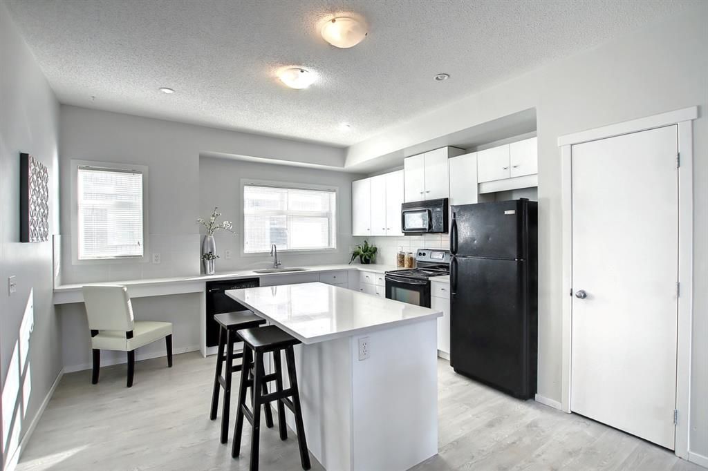 Photo 13: Photos: 39 300 Evanscreek Court NW in Calgary: Evanston Row/Townhouse for sale : MLS®# A1195350