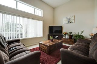 Photo 2: 10 Crystal Shores Cove: Okotoks Row/Townhouse for sale : MLS®# A1217849