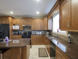 Photo 7: 27933 FRASER Highway in Abbotsford: Aberdeen House for sale : MLS®# R2133585