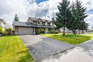 Photo 1: 8378 143A Street in Surrey: Bear Creek Green Timbers House for sale in "BROOKSIDE" : MLS®# R2557306