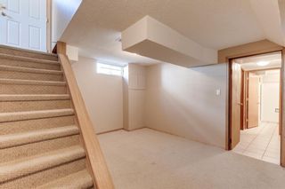 Photo 22: 128 Sackville Drive SW in Calgary: Southwood Detached for sale : MLS®# A1246298