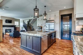 Photo 5: 160 Fortress Bay SW in Calgary: Springbank Hill Detached for sale : MLS®# A2049349
