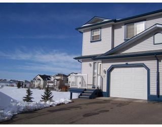 Photo 2: 17 33 STONEGATE Drive NW: Airdrie Townhouse for sale : MLS®# C3411607