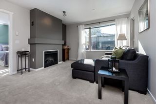 Photo 4: 210 200 KLAHANIE Drive in Port Moody: Port Moody Centre Condo for sale in "SALAL" : MLS®# R2283759