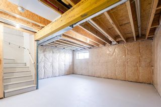 Photo 37: 102 Sundown Close: Cochrane Semi Detached (Half Duplex) for sale : MLS®# A2070990