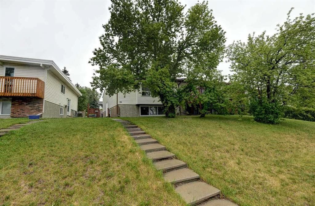 Main Photo: 84 Ranchero Rise NW in Calgary: Ranchlands Semi Detached (Half Duplex) for sale : MLS®# A2059921