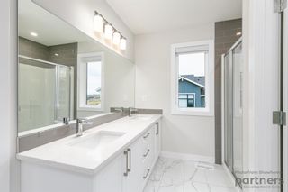 Photo 16: 948 Crestridge Common SW in Calgary: Crestmont Row/Townhouse for sale : MLS®# A2012906