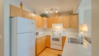 Photo 8: 8 Eversyde Court SW in Calgary: Evergreen Row/Townhouse for sale : MLS®# A1218207