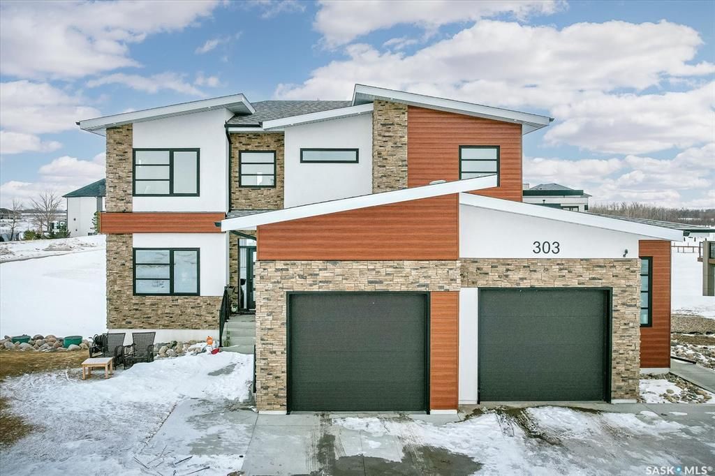 Main Photo: 303 Greenbryre Crescent North in Greenbryre: Residential for sale : MLS®# SK916180