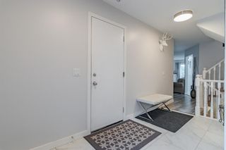 Photo 9: 202 Coachway Lane SW in Calgary: Coach Hill Row/Townhouse for sale : MLS®# A1257283