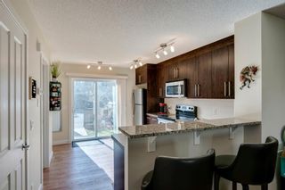 Photo 11: 113 ASPEN HILLS Drive SW in Calgary: Aspen Woods Row/Townhouse for sale : MLS®# A1057562