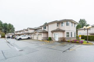 Photo 1: 33 19060 FORD Road in Pitt Meadows: Central Meadows Townhouse for sale in "Regency Court" : MLS®# R2857383
