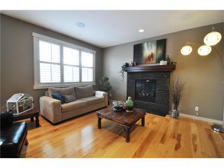 Photo 4: 92 MIKE RALPH Way SW in Calgary: Garrison Green House for sale : MLS®# C4045056