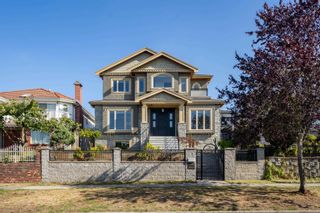 Photo 1: 1909 E 64TH Avenue in Vancouver: Fraserview VE House for sale (Vancouver East)  : MLS®# R2815433
