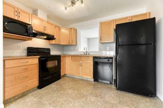 Photo 12: 156 Everhollow Heights SW in Calgary: Evergreen Row/Townhouse for sale : MLS®# A2123116