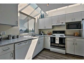 Photo 6: # 402 3720 W 8TH AV in Vancouver: Point Grey Condo for sale in "HIGHBURY PLACE" (Vancouver West)  : MLS®# V1018375
