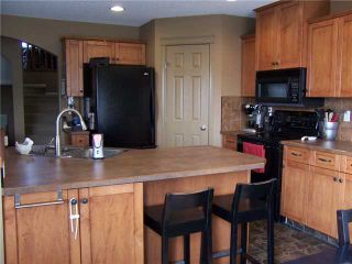 Photo 8: 58 EVANSMEADE Manor NW in CALGARY: Evanston Residential Detached Single Family for sale (Calgary)  : MLS®# C3540721