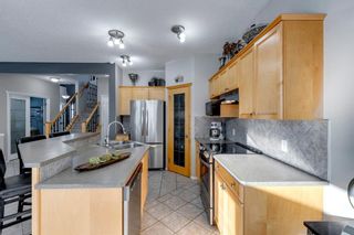 Photo 11: 100 Tuscany Meadows Common NW in Calgary: Tuscany Detached for sale : MLS®# A1186230