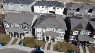 Photo 2: 187 Carringham Road NW in Calgary: Carrington Semi Detached (Half Duplex) for sale : MLS®# A2122727