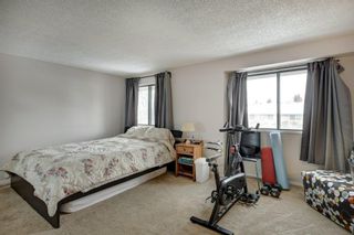 Photo 16: 143 Woodvale Bay SW in Calgary: Woodlands Row/Townhouse for sale : MLS®# A2022754