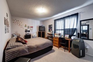 Photo 19: 2 123 Queensland Drive SE in Calgary: Queensland Row/Townhouse for sale : MLS®# A2010360