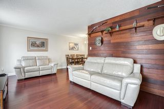 Photo 2: 102 14147 104 Avenue in Surrey: Whalley Townhouse for sale in "Hawthorne Park" (North Surrey)  : MLS®# R2853808