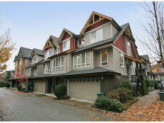 Photo 1: 44 16789 60TH Avenue in Surrey: Cloverdale BC Townhouse for sale in "LAREDO" (Cloverdale)  : MLS®# F1324854